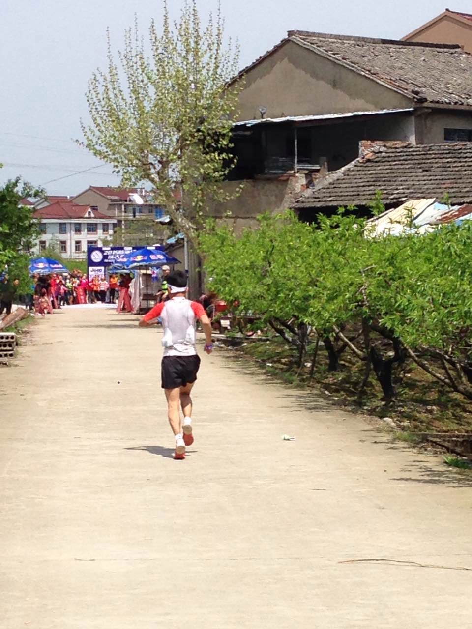 Yan Longfei running towards the finish to win the 2015 edition of TT Plus