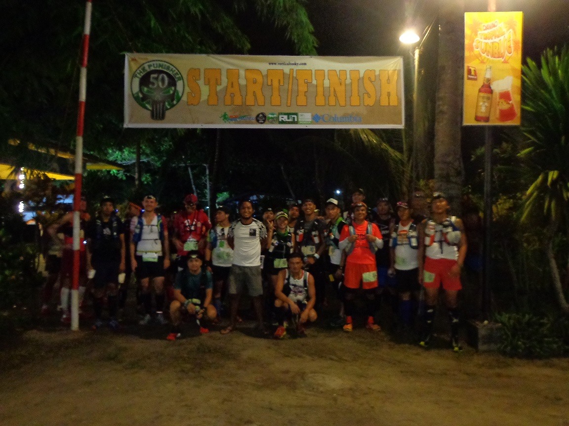 The start of the race at night with race director Doi Calbes in the middle