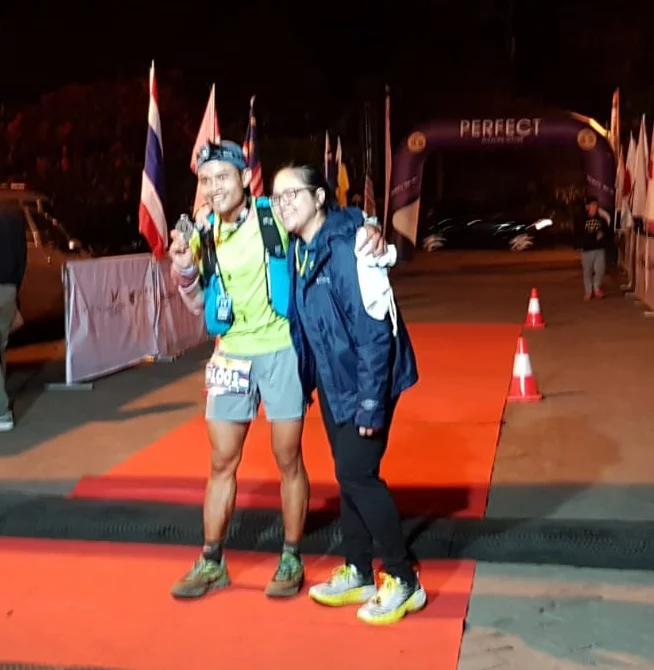 Arief flanked by his wife comes in 2nd