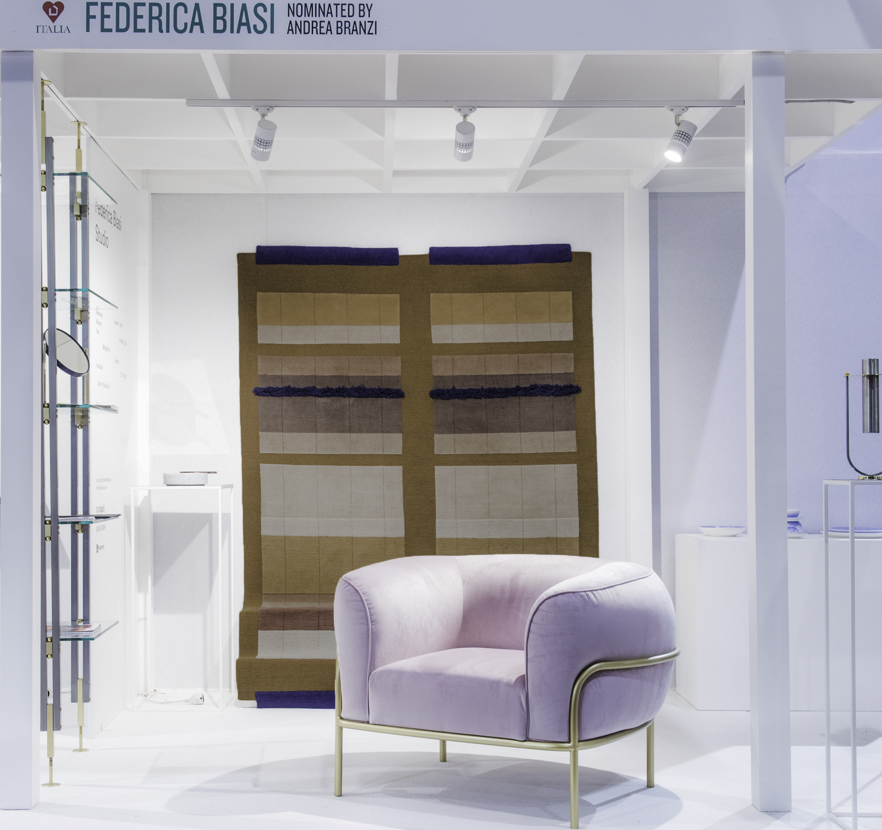 Federica Biasi stand at Maison & Objet, January 2018, with Sophie armchair and Óm rug in earthly tones with North-African fabric patterns designed in collaboration with CC-TAPIS . © Maison&Objet