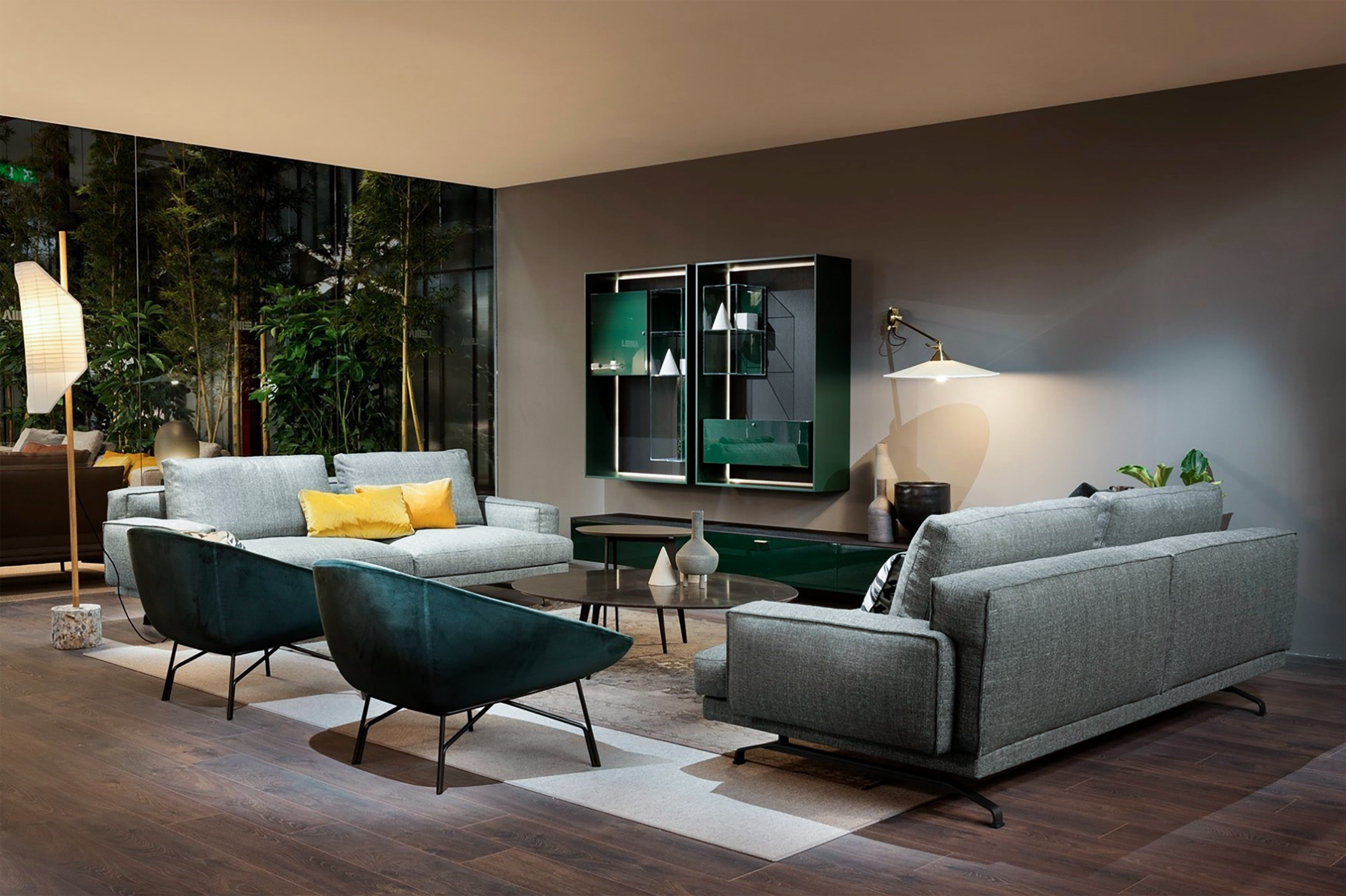 Pair of Lennox lounge chairs - 2015 and Moustique sofa - 2013 by Gordon Guillaumier with Flowers coffee table - 2009 by Roberto Lazzeroni and LT40 customisable daytime system - 2019 by David Lopez Quincoces ⓒ Lema