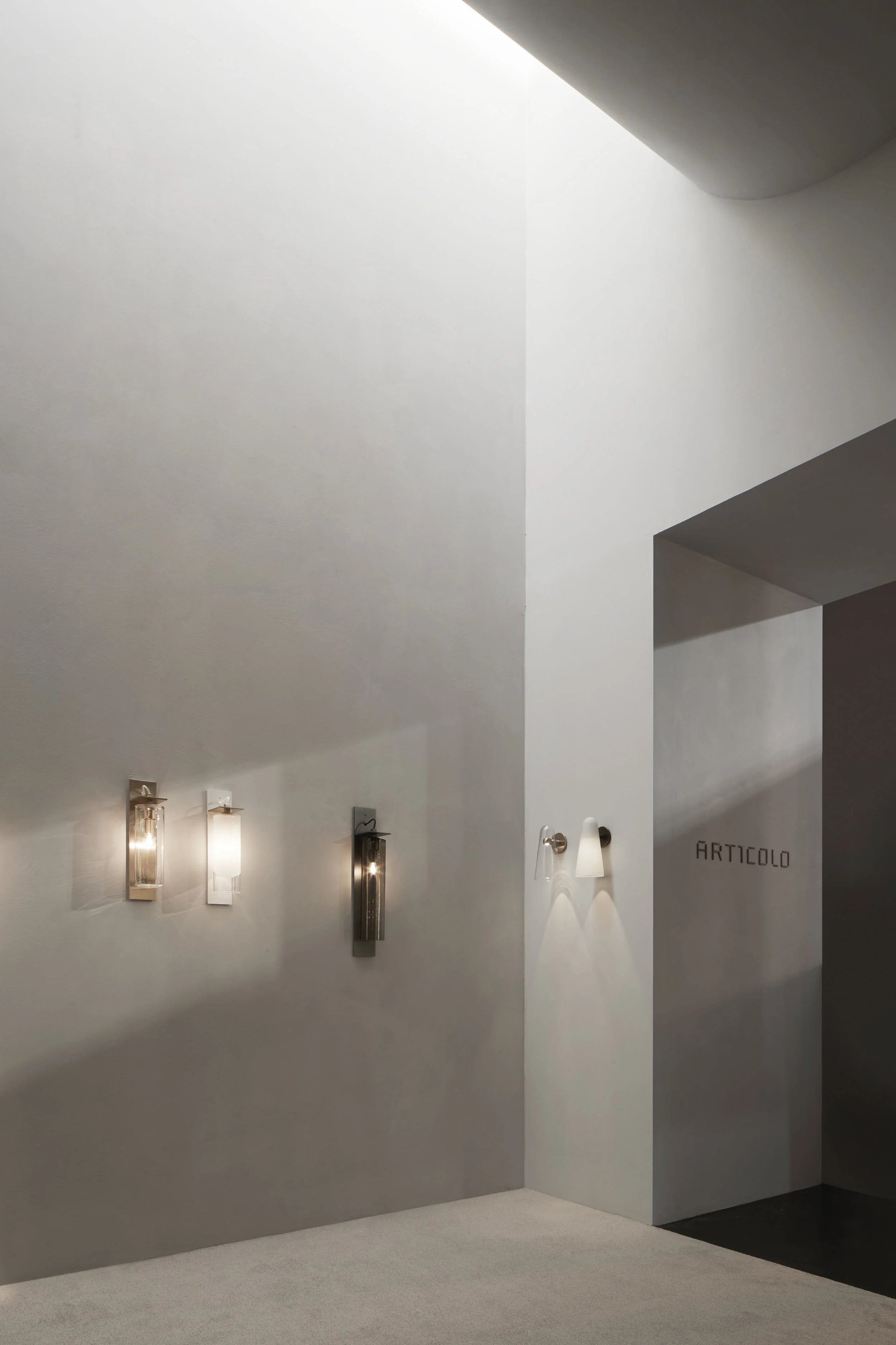 Eclipse wall sconces (left), Domi wall sconces (right), Euroluce 2019 ⓒ Willem-Dirk du Toit Stand design by: Studio Goss