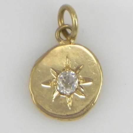14kt yellow gold with Old Mine Cut diamond.