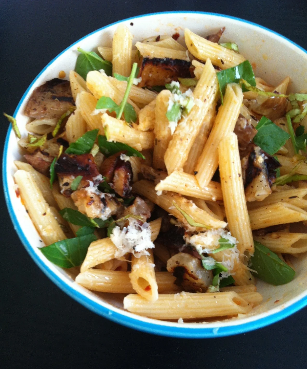 summer penne with grilled eggplant, fresh greens, and romano cheese
