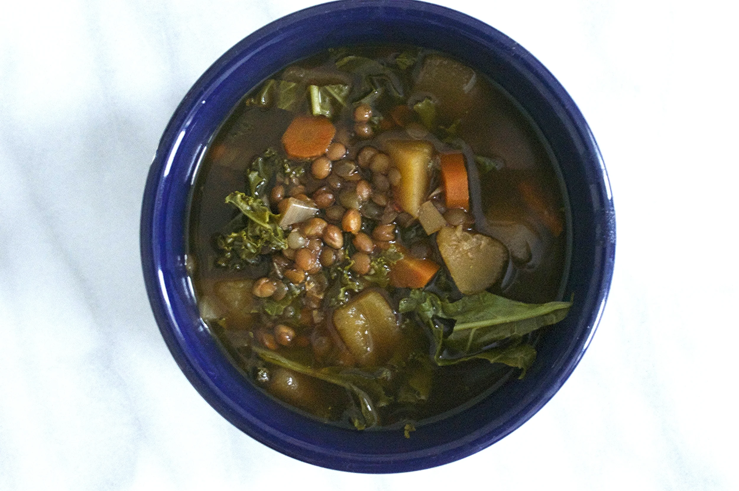 sweet-sour-slow-cooker-lentil-vegetable-soup-whole-bowl-overhead-molasses-and-mayhem.jpg