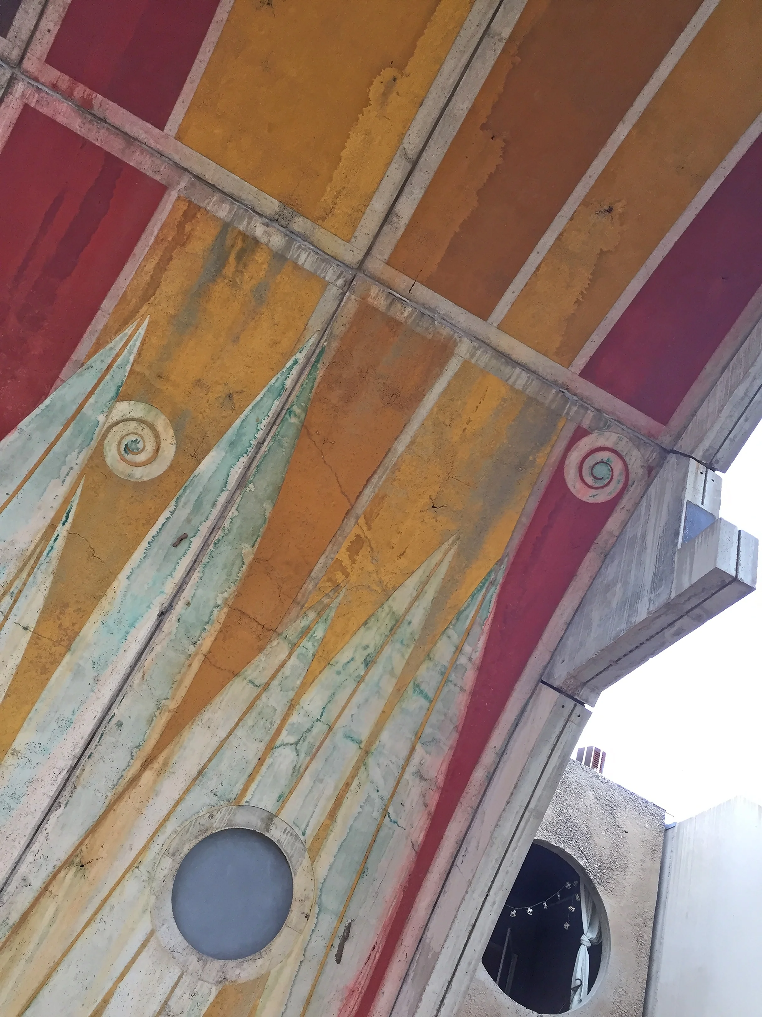 Pigment applied to concrete formwork provides lasting, integral color to massive vaults that provide shade in summer months