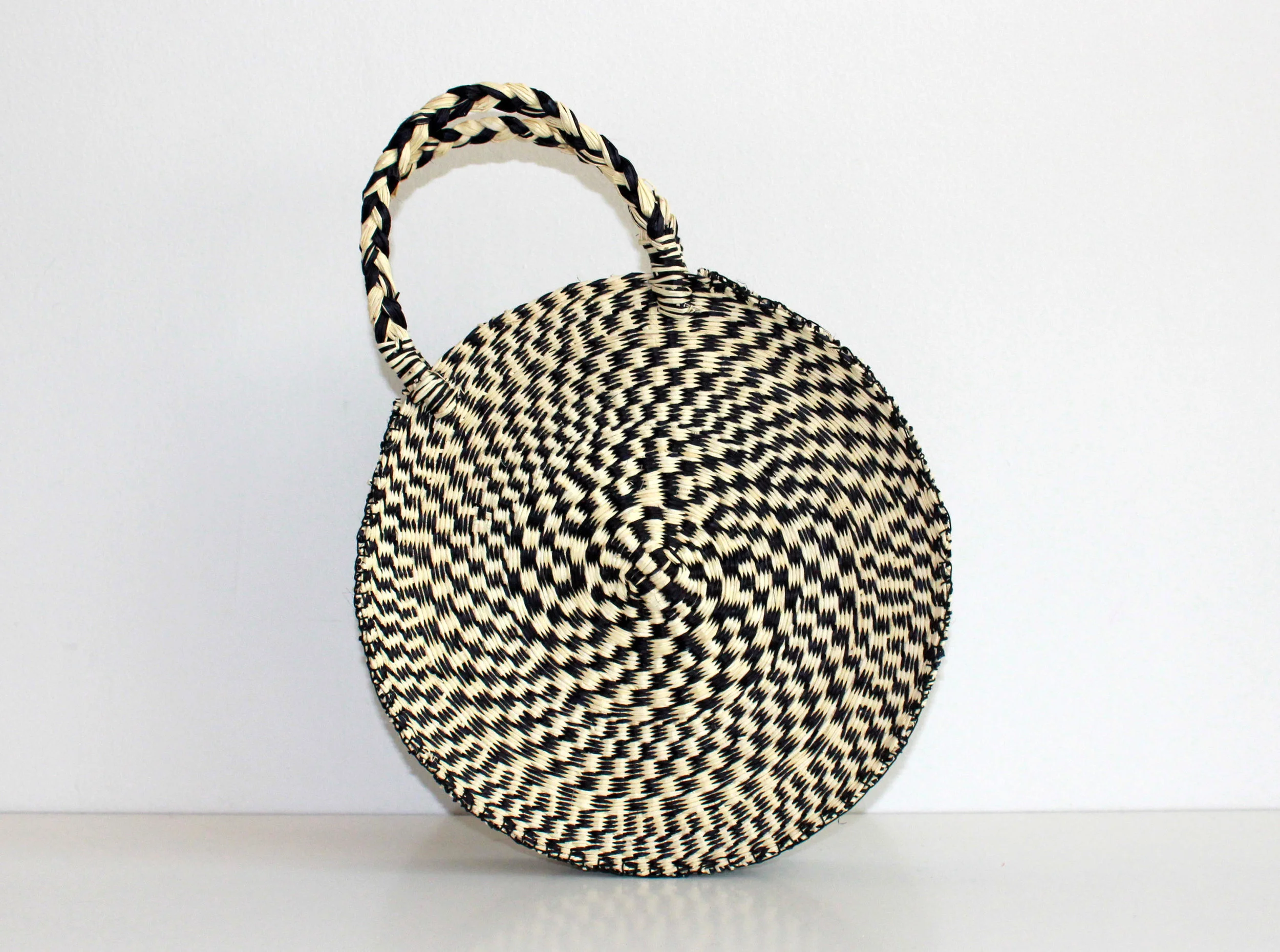One of Back to Basil's summer must-haves! The Circular Bag from Shicato, handwoven in Ecuador. // $142