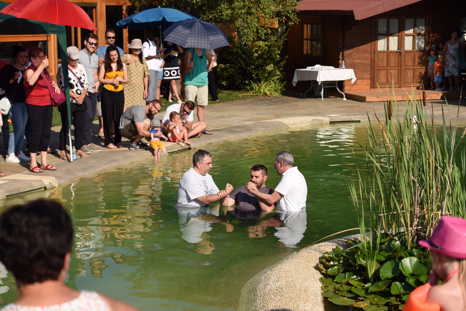July 29, 2018: Daniele is pictured here being baptized by his pastor and discipler, Antonio, on one of the hottest days of the year.