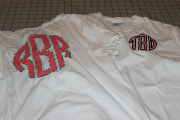 The original t-shirt and another larger version on the back of the t-shirt