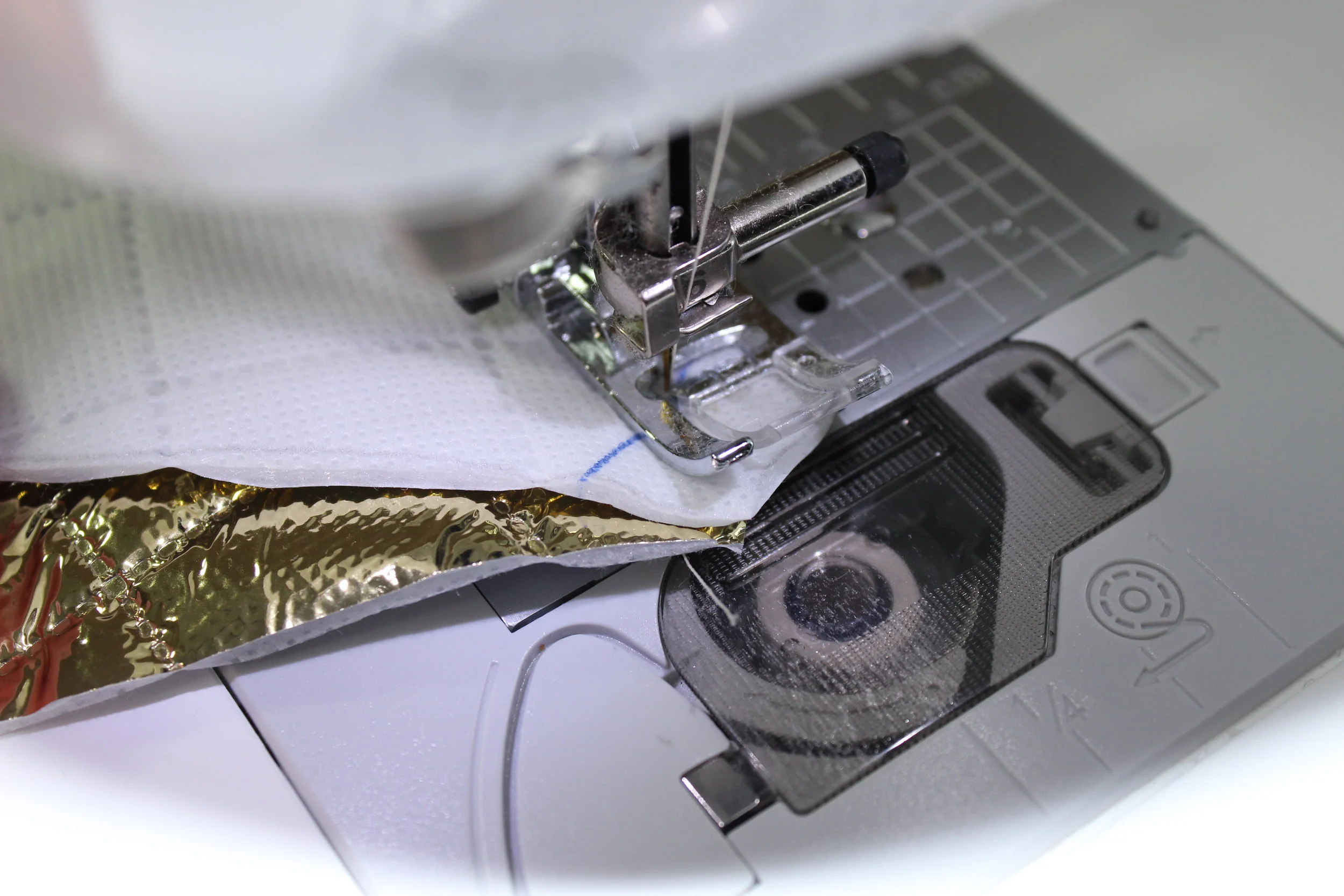 Stop sewing about 2 stitches after the ½” mark at the top of the gore
