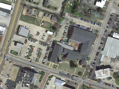 Parking is available in eitherr church parking lot or at the hotel across N Fredonia St. 