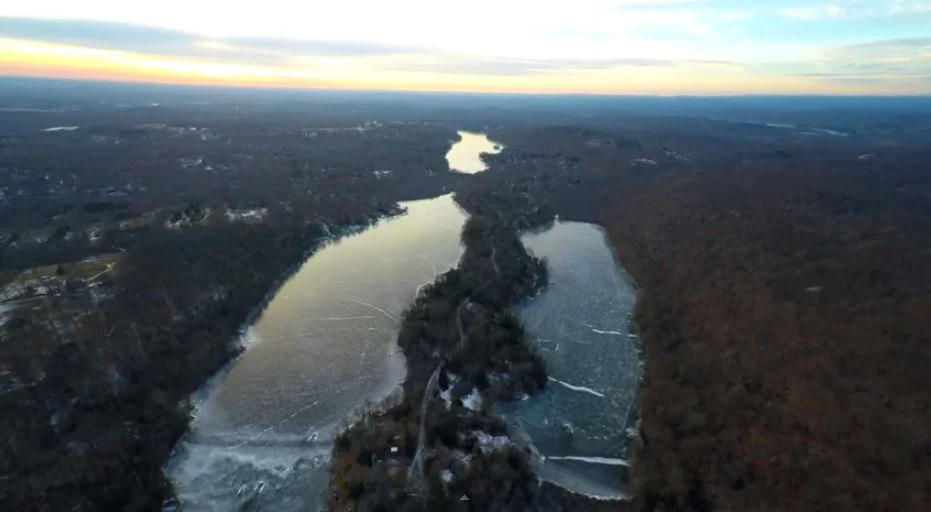 Feb 2015 photo taken by drone camera operated by Peter Treyz. Lake Waccabuc is at the center top of the photo.