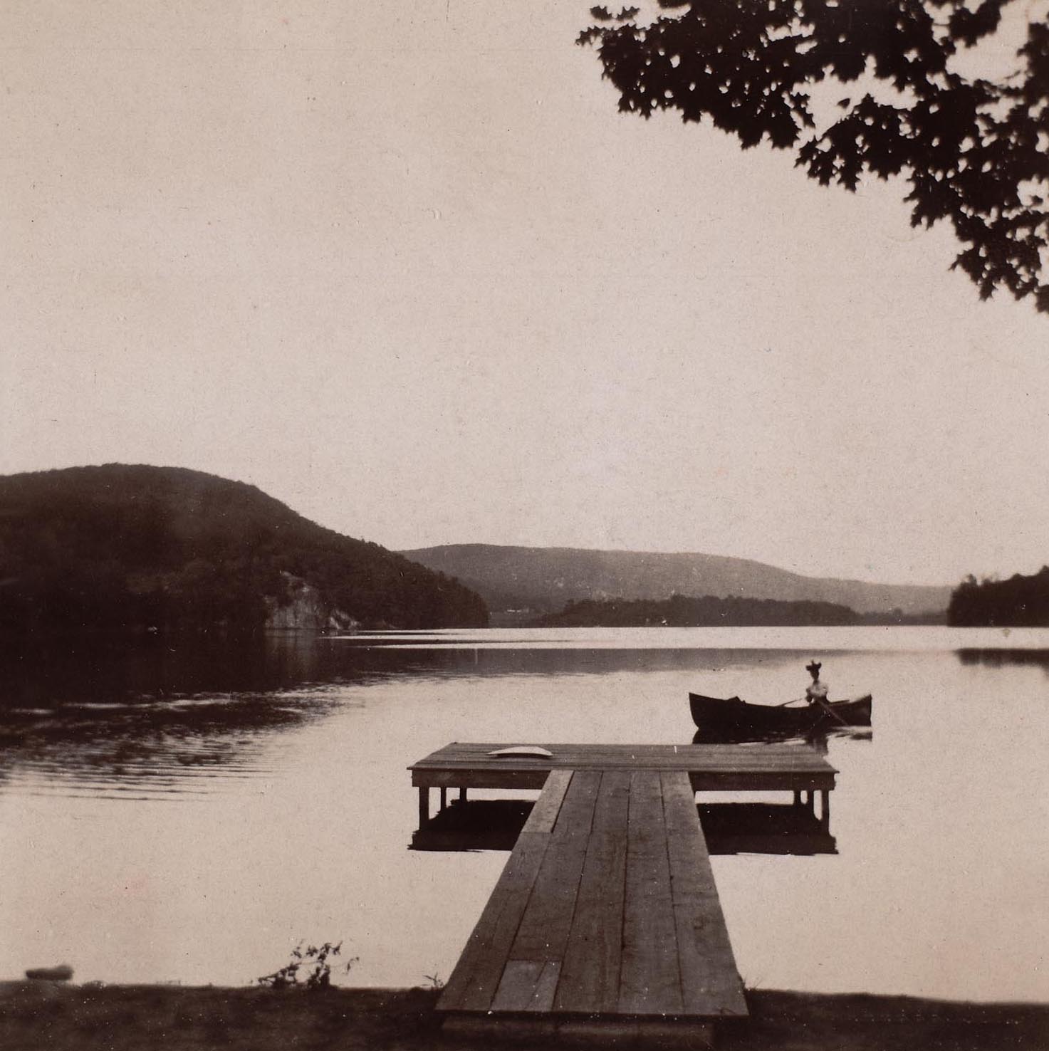 Taking the canoe out from Waccabuc Hotel boathouse; Castle Rock is in the background