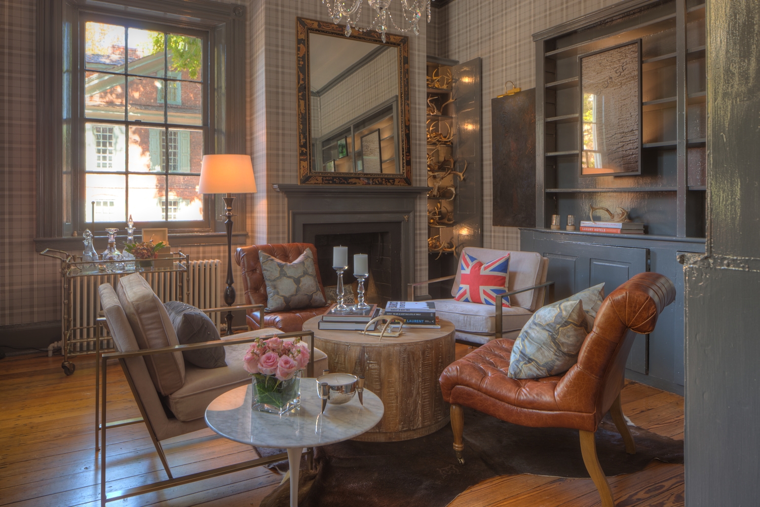 An especially ugly HDR image, you can see that it fixes the issue with the window but everything looks grimy. Another issue is that the colors are exaggerated in an unnatural way. This image is decidedly cheaper looking than the first image done with supplemental lighting.