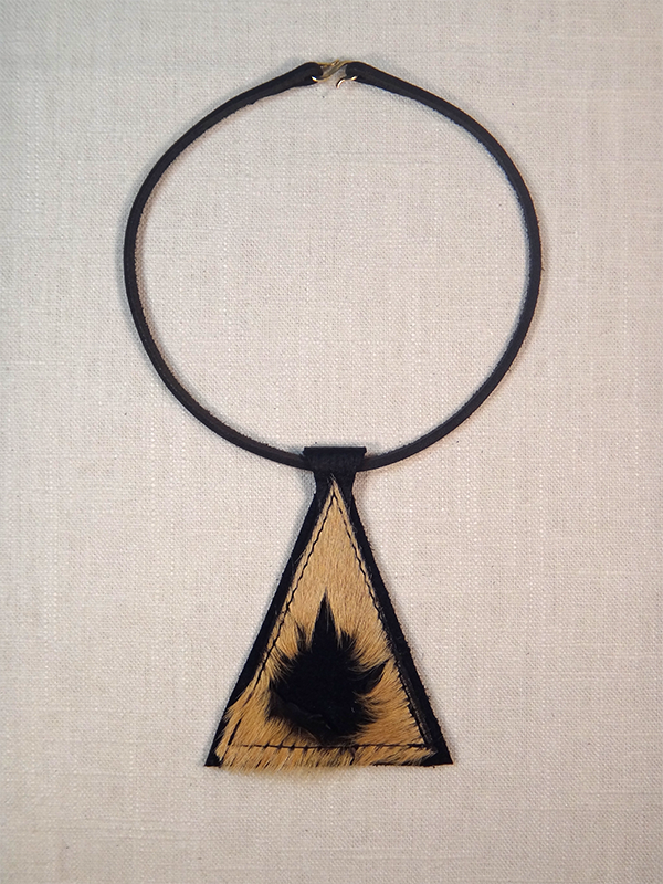 wound w necklace.png