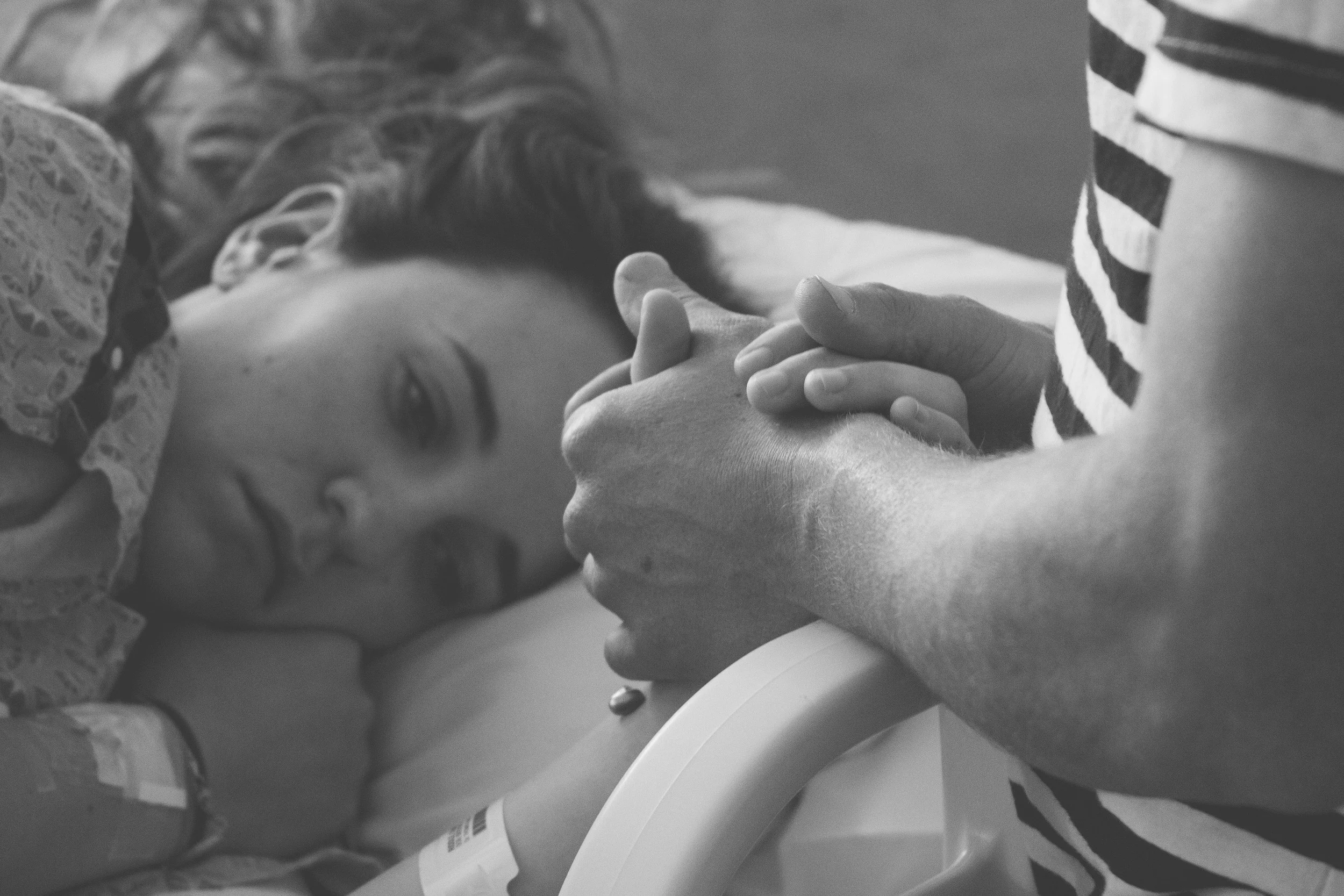 I instantly tell all my sisters to call my mom, as she hasn't returned from her walk. No one can get ahold of her. My husband kept trying to console me telling me to not worry. They finally get ahold of my mom, and she is running back. I finally clear my thoughts in my head and realize i am ready. I’m ready to meet my girl. I tell the nurse i am ready to push. She begins to get the room and bed prepared. I have the girls get the music playing again. The nurse gives me some instructions on how to push, and we practice. She asks Andrew to count to 10, and for me to push, take a deep breath and do it again for 3 times in a row. Andrew is counting so slow that by number 4 i am out of breath and will pass out if he counts like a turtle. He says he is just “following the clock” I firmly and loudly state “count faster. i don’t care about the clock.” I felt bad, but i didn’t want to pass out trying to hold my breath for what felt like 25 seconds. He perfected the counting, and i was now really pushing. 