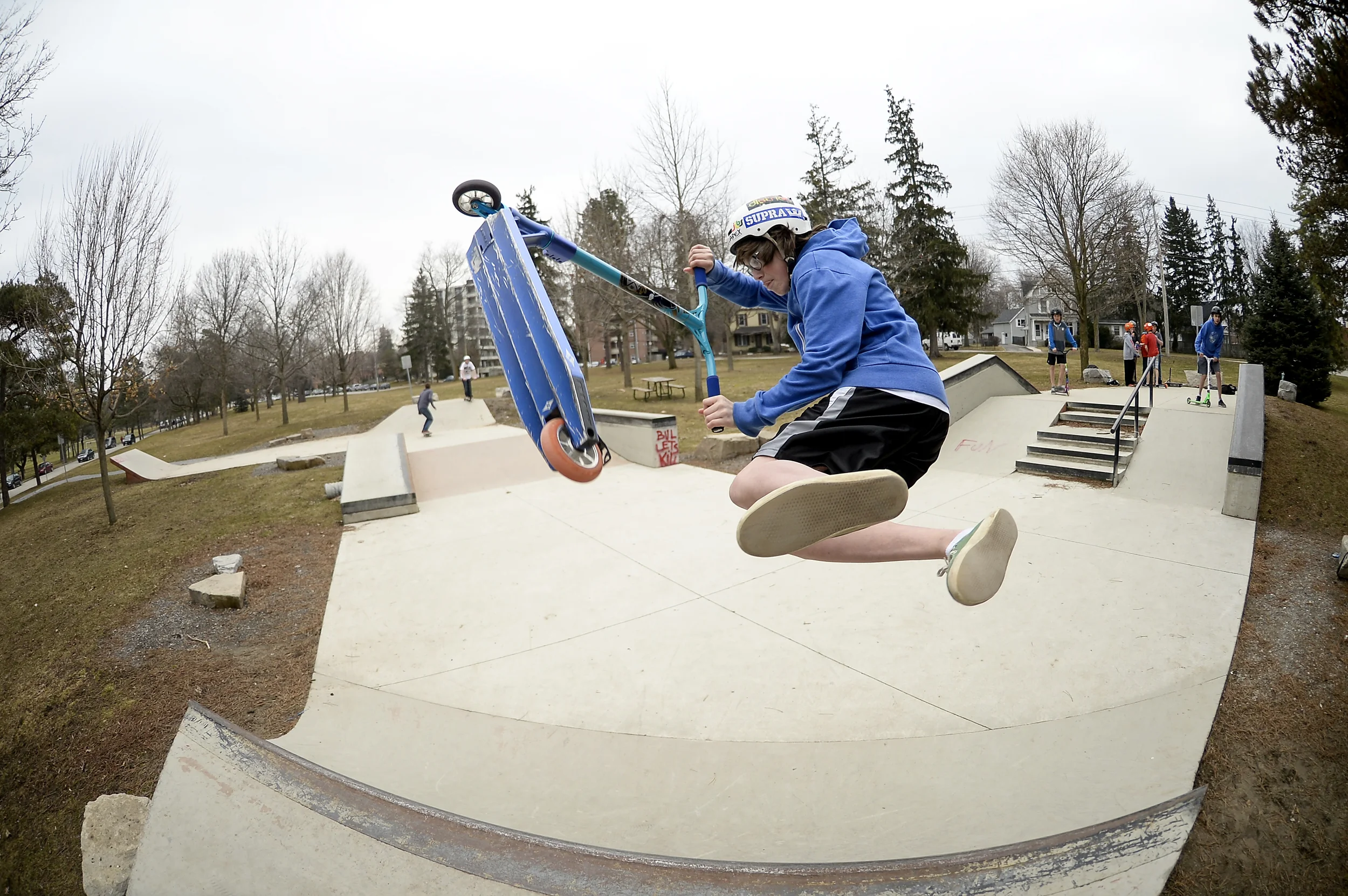  Taylor Blair, 14, performs a bri flip at the skate park in Springbank Park in London, Ont. on Friday April 3, 2015. Warm weather and a holiday brought lots of kids out to the park to ride. 