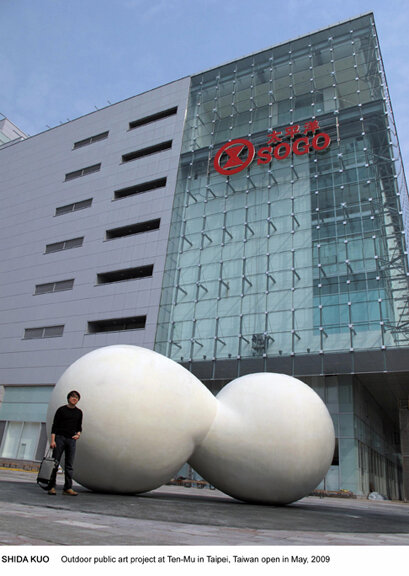 SOGO sculpture with artist web.jpg