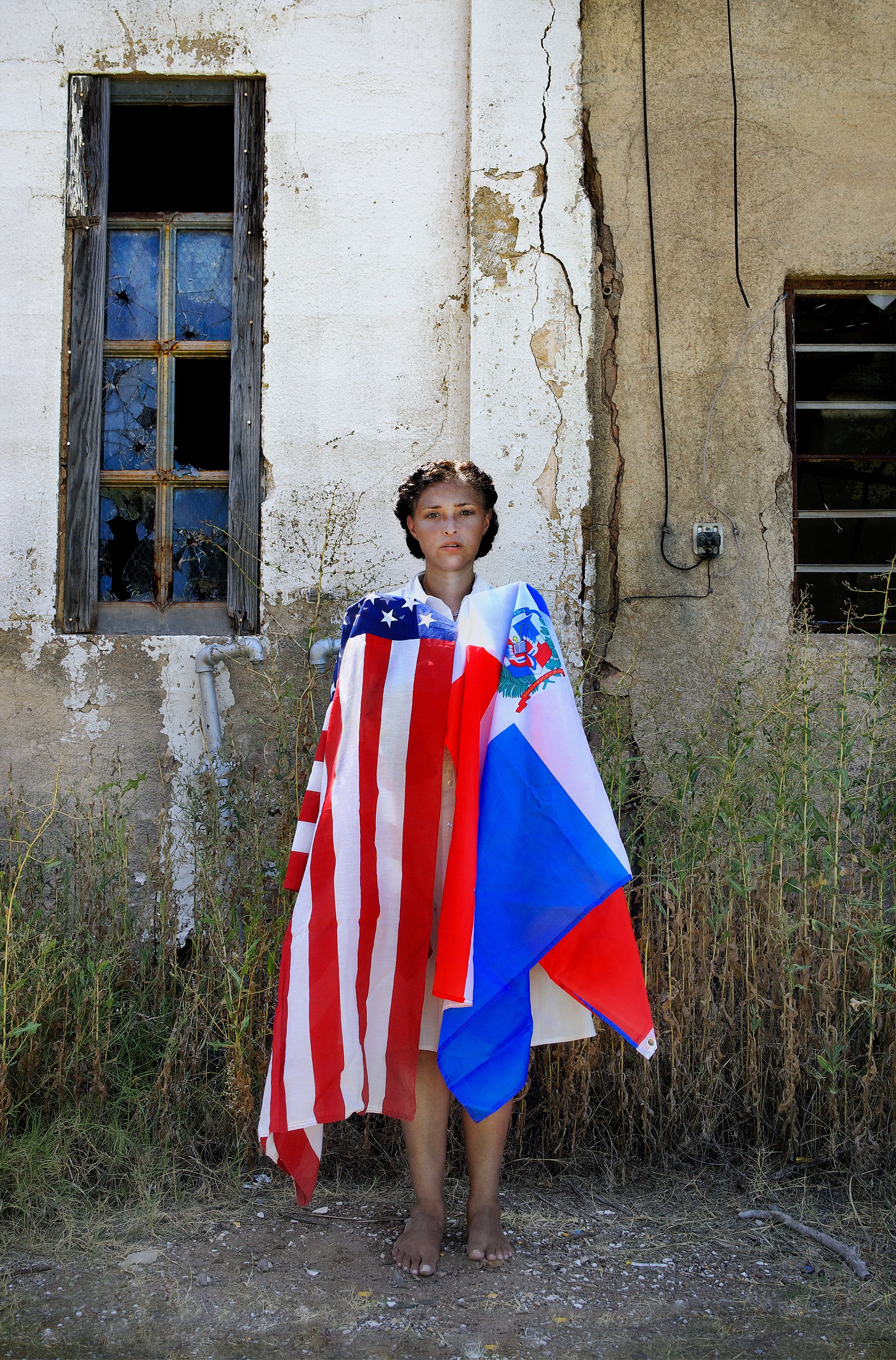 Carmen-Self portrait with the dominican and American flags.jpg