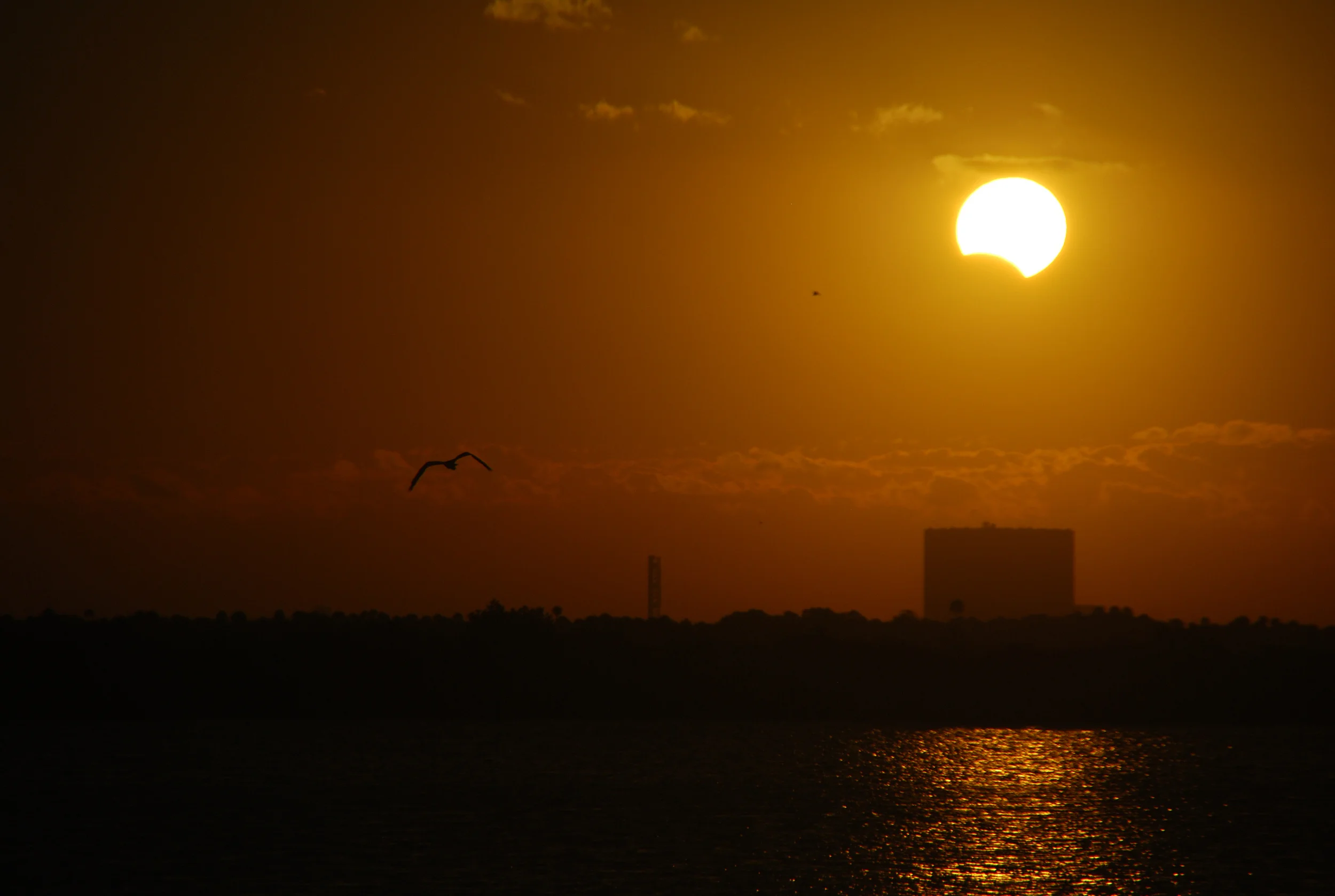Partial eclipse over the Vehicle Assembly Building at the Kennedy Space Center. Copyright David Dickinson, November 3, 2013