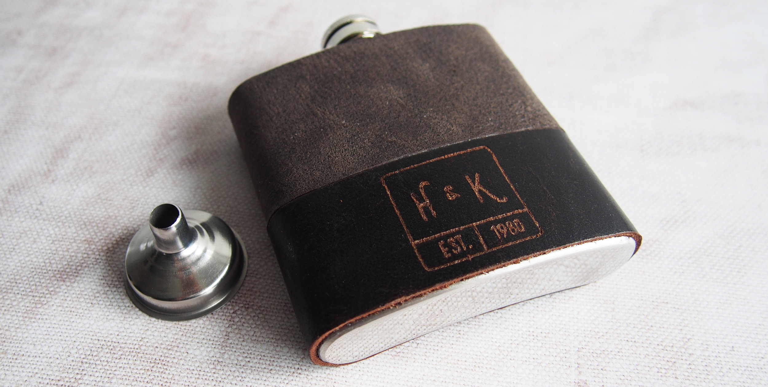 A momento for your wedding day, this monogram flask is perfect for the newly weds. From £35 by HÔRD