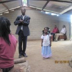 SURVIVING TWIN WITH HER FATHER AT YAHWEH'S CHAPEL