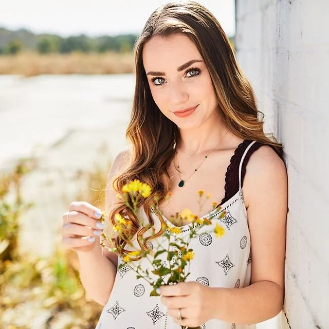 From friendly to feisty.  Oh and you can touch flowers 💐. I think. 🤔😷🦠 #jpylesenior @skylarmoore_ #seniors #seniorpictures #jpyle #eyes #portraits #johnpyle
