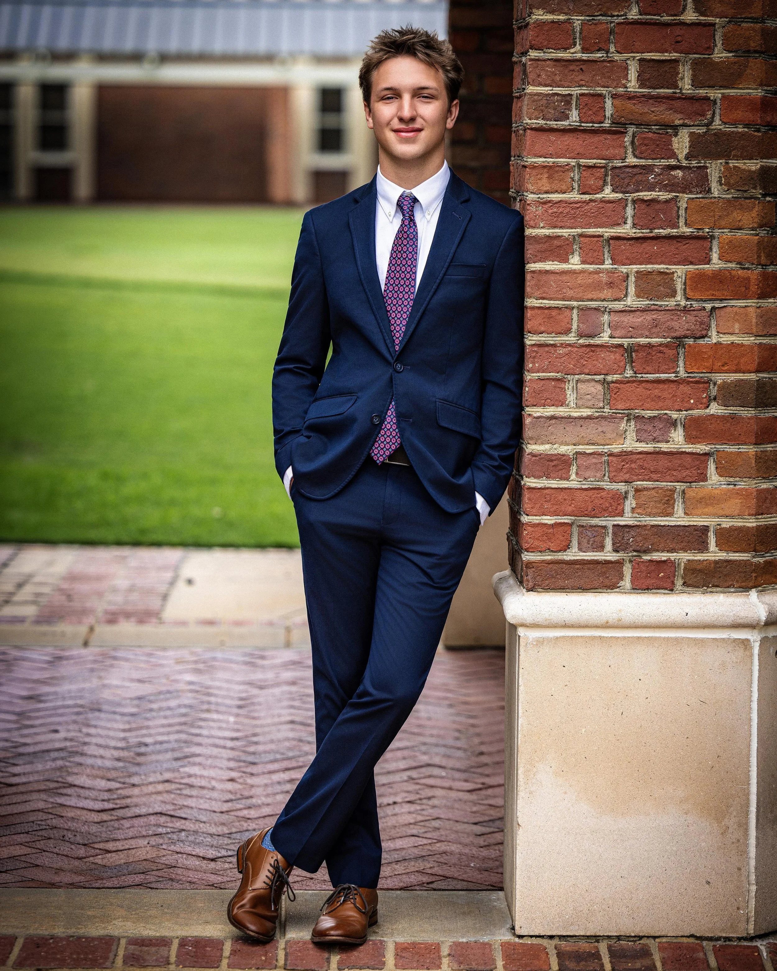 Not every senior session has to look the same.

A well-tailored suit. Clean light. Timeless portraits.

Class of 2027 dates remaining at www.johnpyle.com