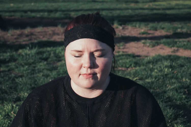 girl with eyes closed