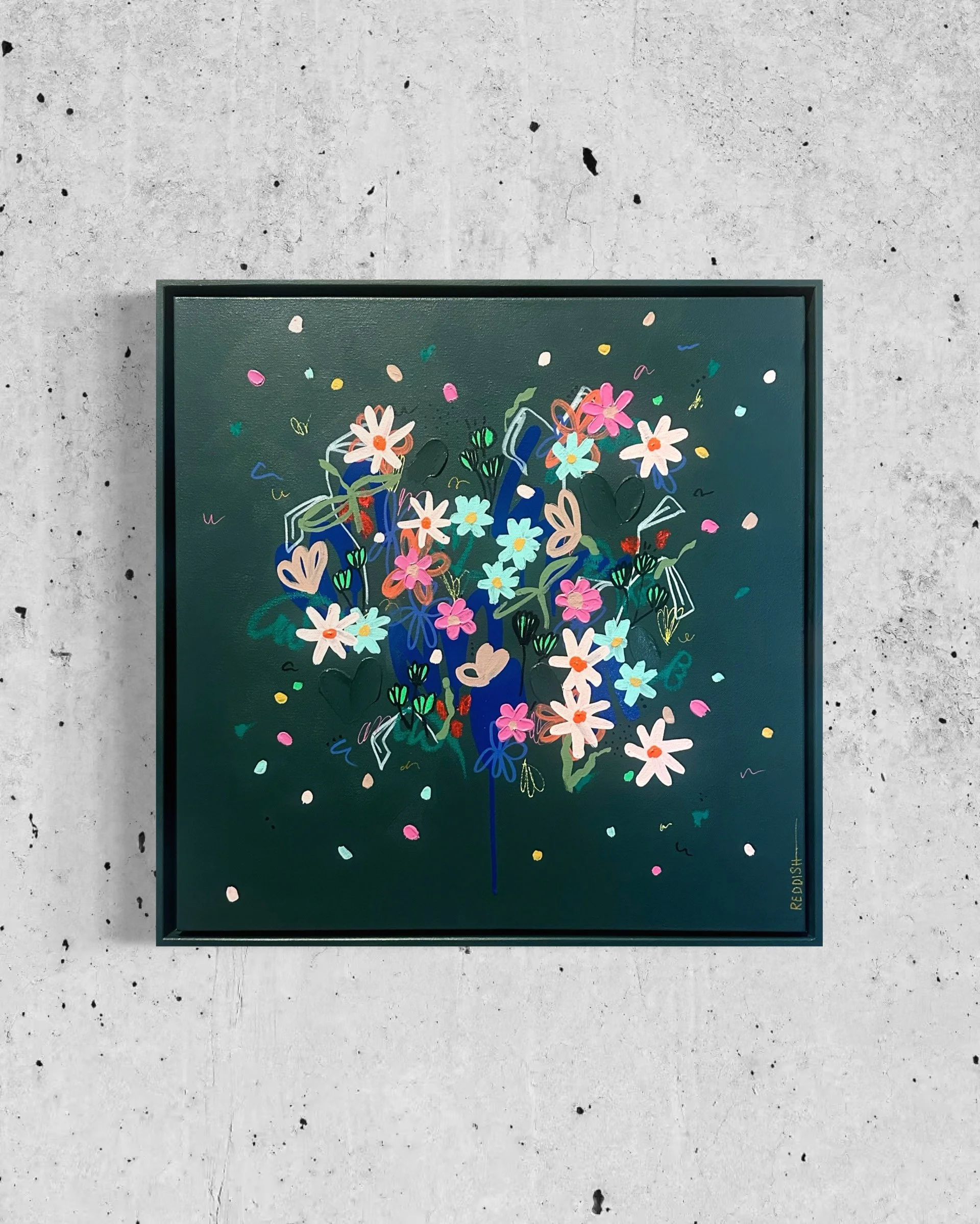 An art print of a colorful bouquet of flowers in a blue vase, with scattered petals and confetti, signed "Redfish" at the bottom right corner.