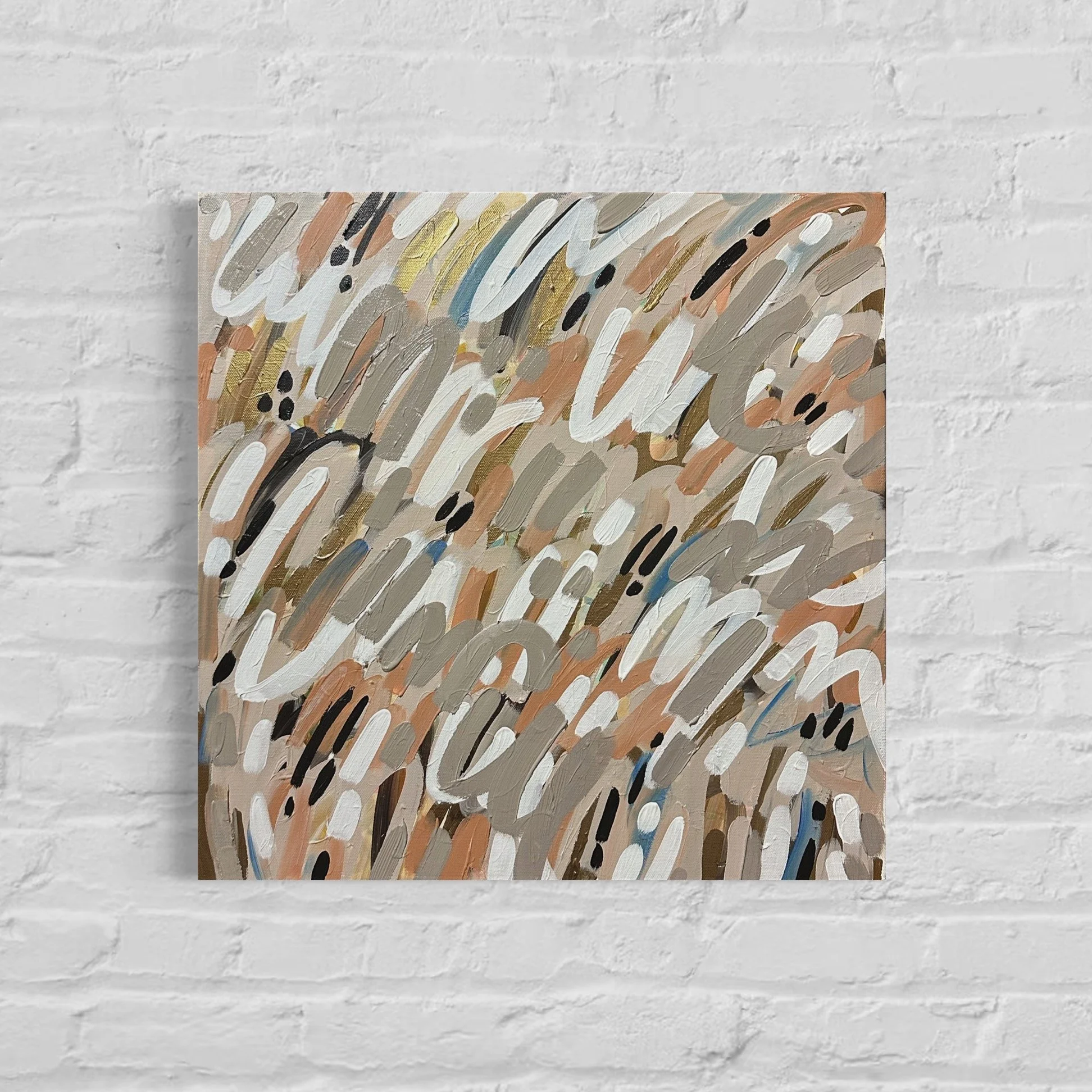 A colorful abstract painting with curved brushstrokes and black dots on a canvas, mounted on a white brick wall.