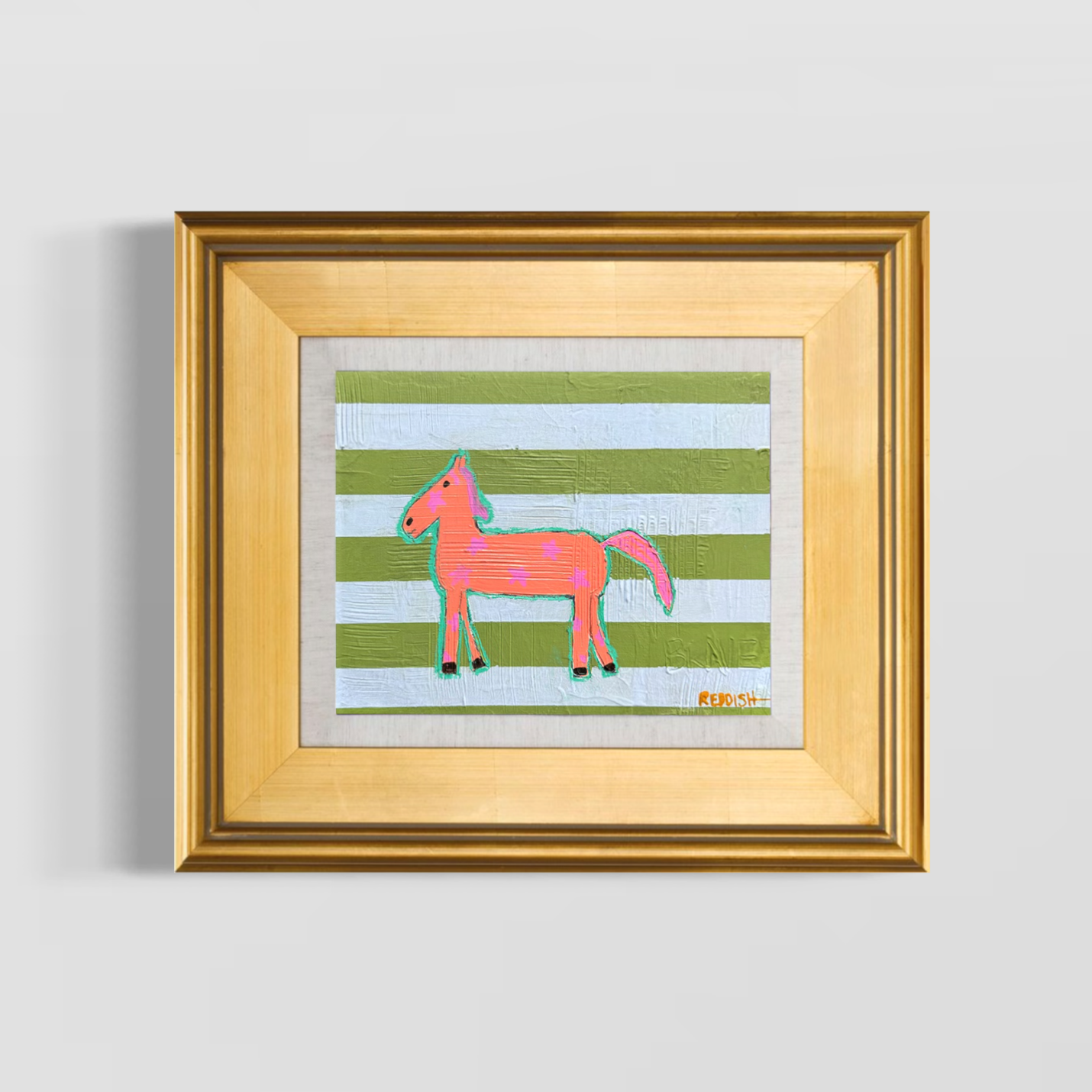 Colorful children's artwork of a pink horse with stars, on a striped green and white background, framed and mounted on a wall.