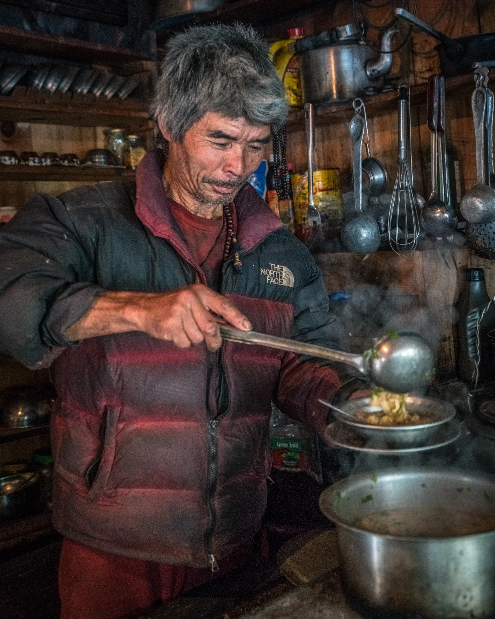 nepali-man-serving-soup.jpg