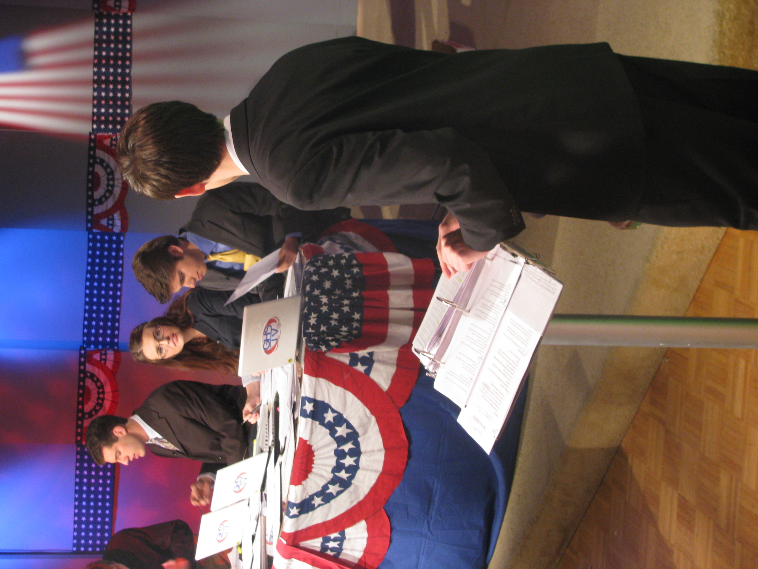 Election Night 2010 moderator Andrew Baldock goes over specifics for an upcoming on-air discussion with US House anchor Marinela Zubovic. 