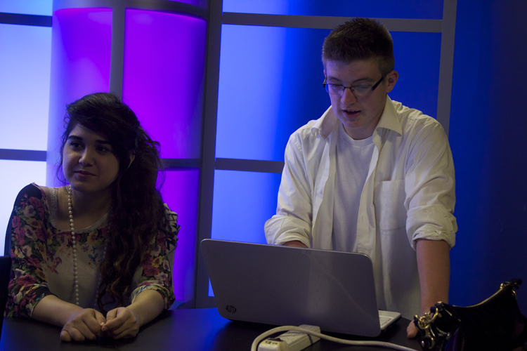 Gubernatorial anchor producer Linda Razany and gubernatorial anchor Will Alton are one of the six anchor teams studying for the November 4th show.