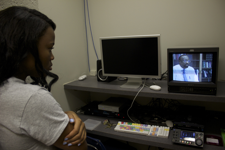  Each of the show's anchor producers are also responsible for producing a report. Local races anchor producer Ericka Garrison looks over an interview she conducted with respected journalists and University of Memphis professor Otis Sanford. 