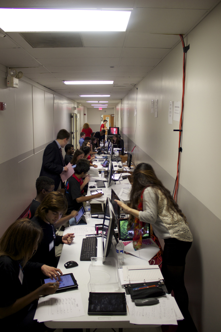 A look down the data entry and research line. Of the numerous aspects of the show that impressed guests Tuesday night, the action in this hallway may have topped the list.