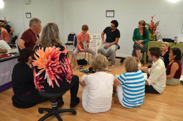  Instructing a group about shoe ergonomics 