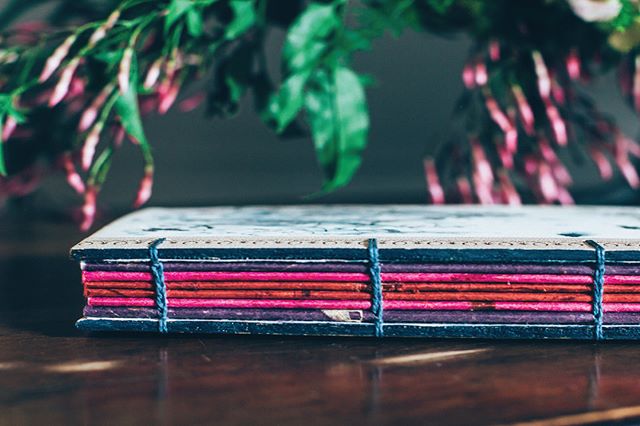 💙💜📕💜💙 What would you use this blank book with an ombr&eacute; spine for? I made it for a wedding photo shoot and found it laying about while cleaning the studio. There are some floral embedded pages scattered throughout and the spine reminds me 