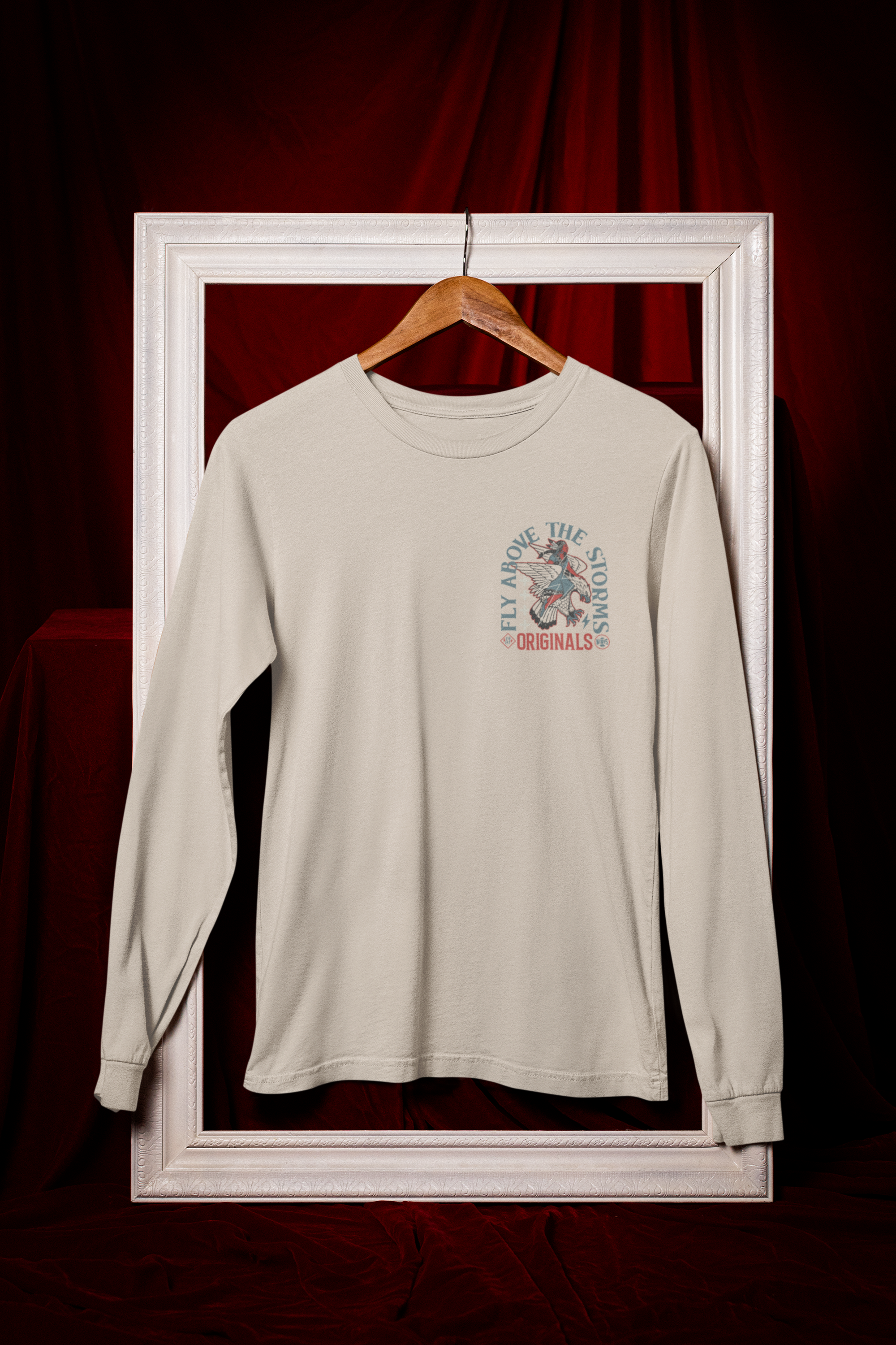 mockup-of-a-bella-canvas-long-sleeve-t-shirt-hanging-from-a-decorative-frame-m41054.png