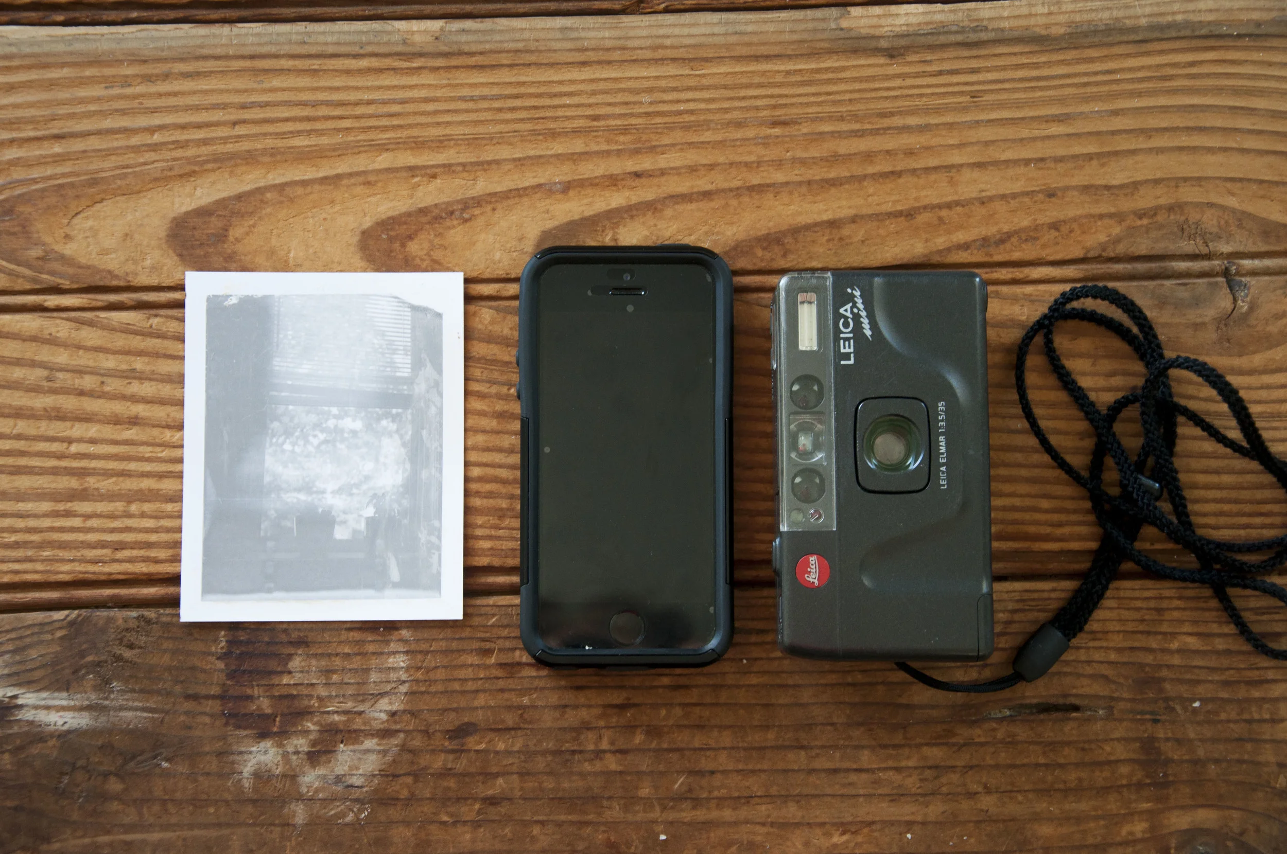 For size comparison, Polaroid Type 107 3 1/4x4 1/4 iPhone 5s and then the Leica mini