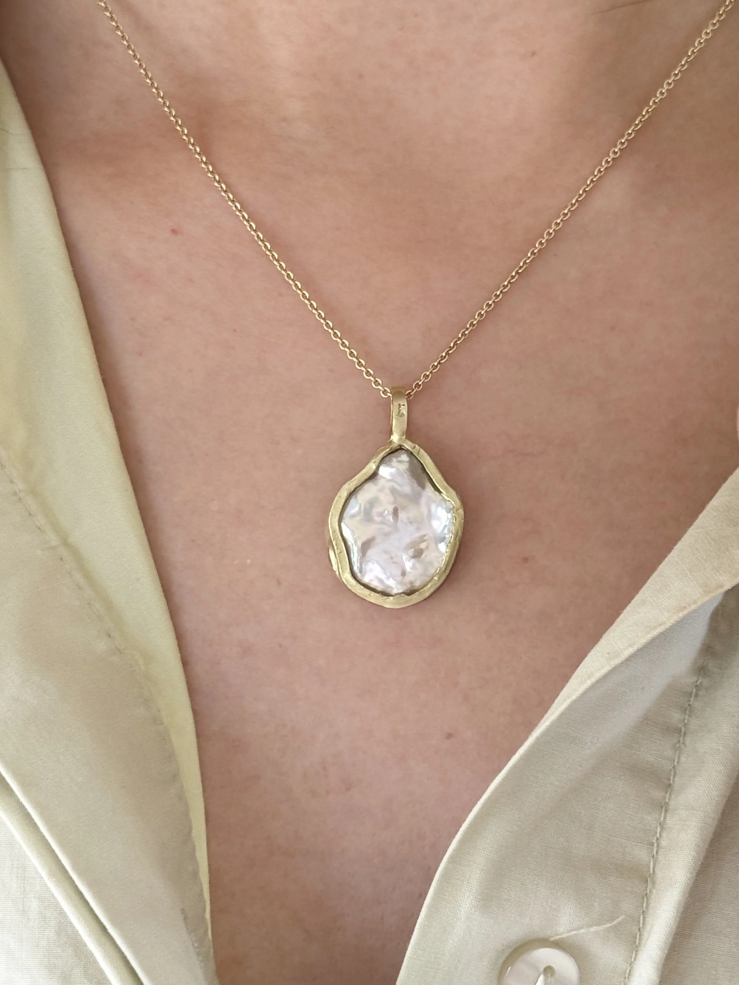 Francesca-Lacagnina-Jewelry-18K-Gold-Large-Baroque-Pearl-Pendant_P033G18PRL_ON-MODEL-01 .jpg