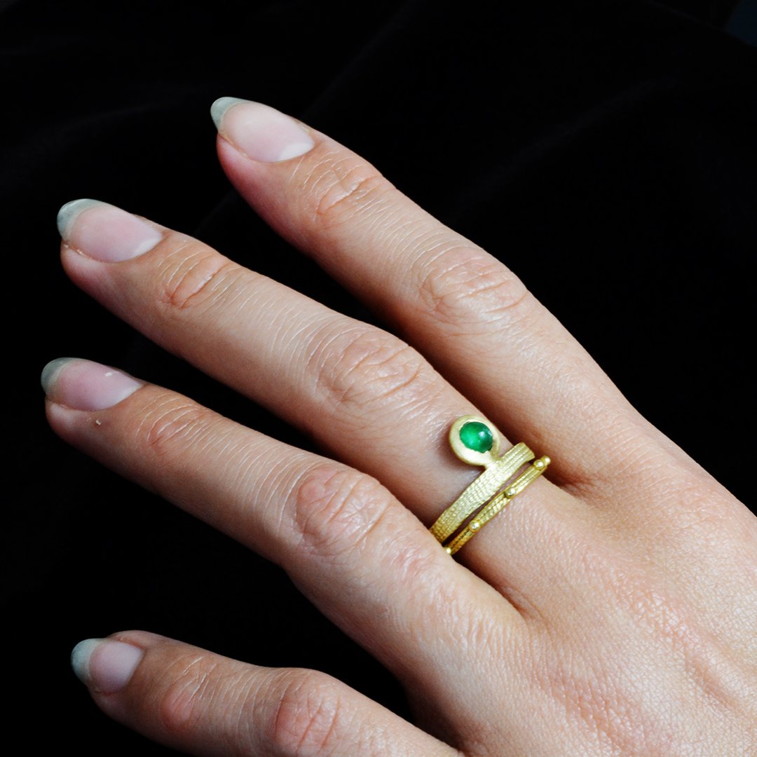 Francesca Lacagnina Jewelry_18k Gold and Emerald Ring with 18K Gold Band_R170G18EM and R168G18_ON MODEL.jpg