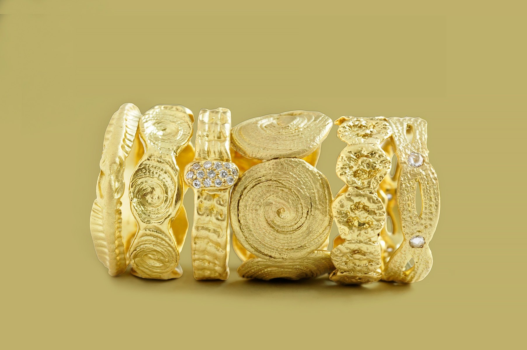 francesca-lacagnins-18k-gold-bands-yellow-background.jpg