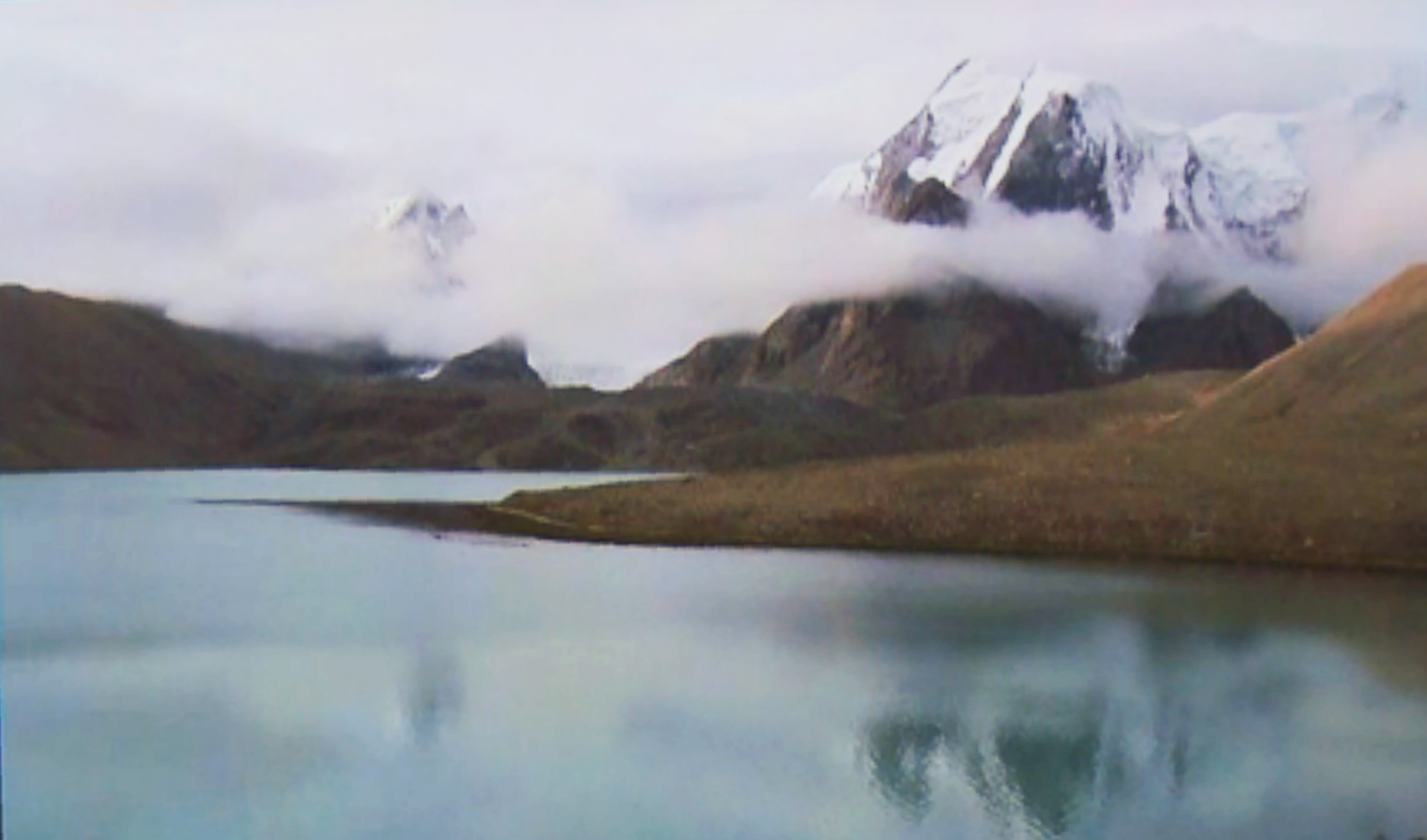 The landscape of the sacred Himalayan mountains where Tibetan monks meditate in their process of transfiguration into Rainbow Body.