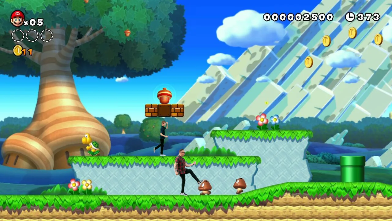 Father and son put inside a Mario game in cincinnati Ohio Family photoshoot.jpg