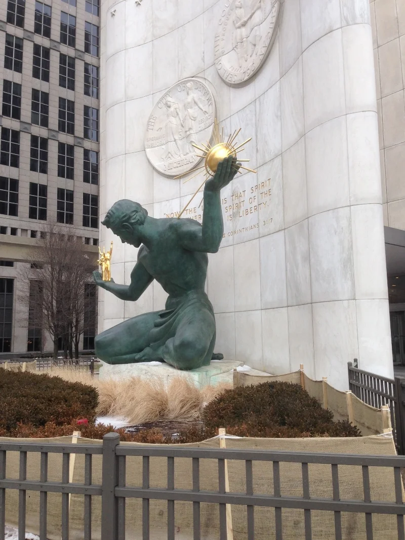 "The Spirit of Detroit" with 2 Corinthians 2:17 behind it.
