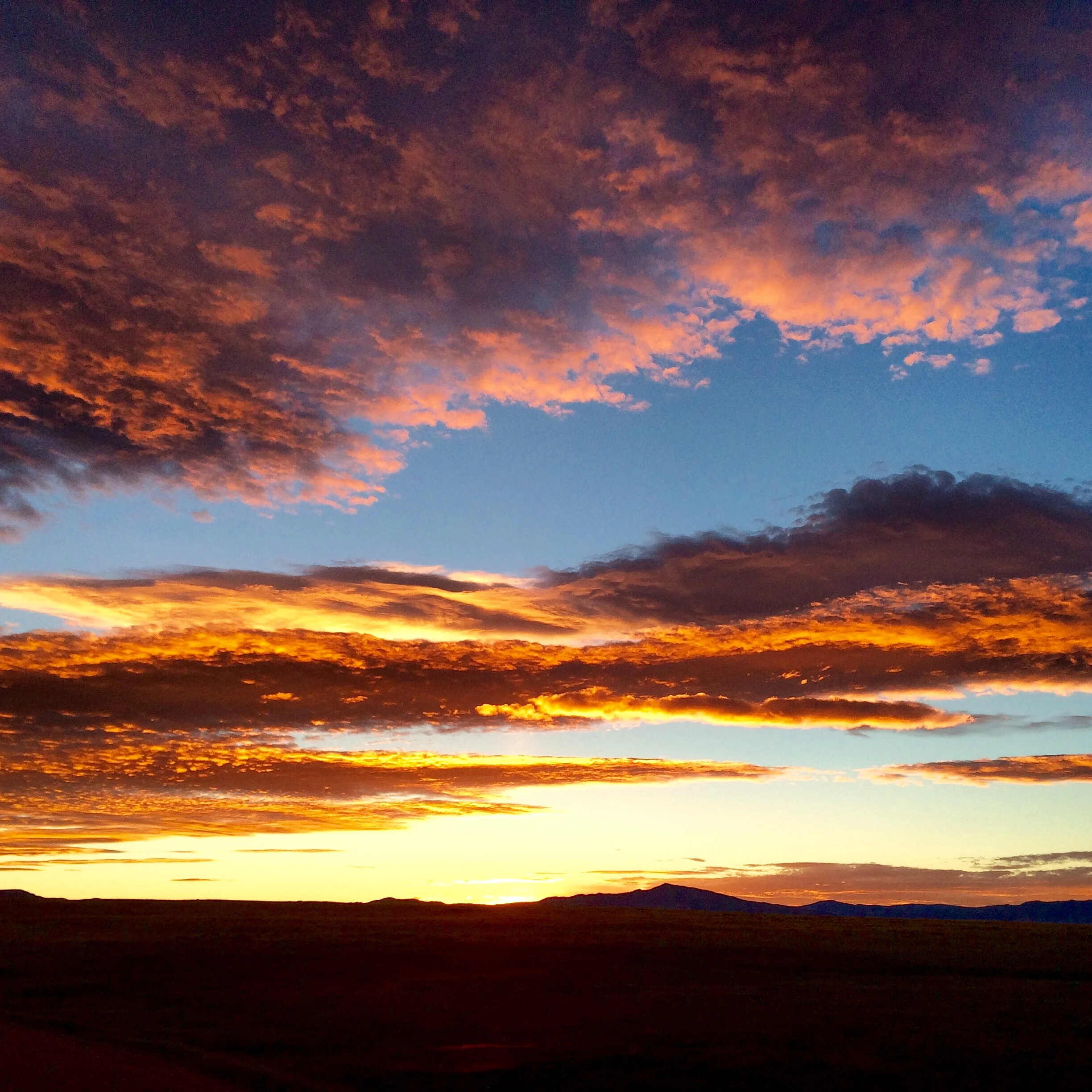 Sunset over the Snowy Range going in to the cabin Sportsman Rd