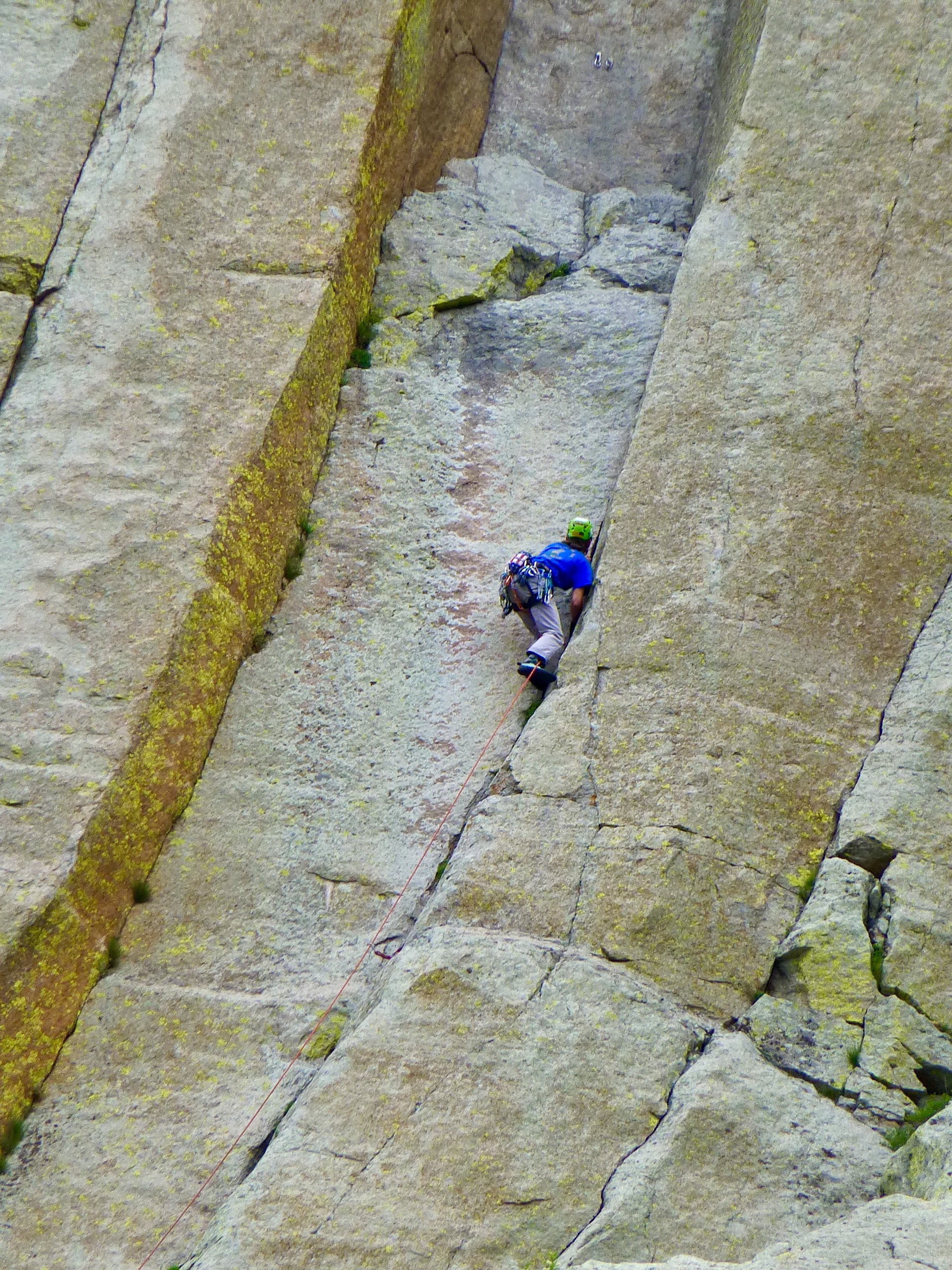 A climber two-thirds of the way up. Most ascents take 6-10 hours for the round trip. The record set in the 1980's for a free climb solo is 18 minutes!