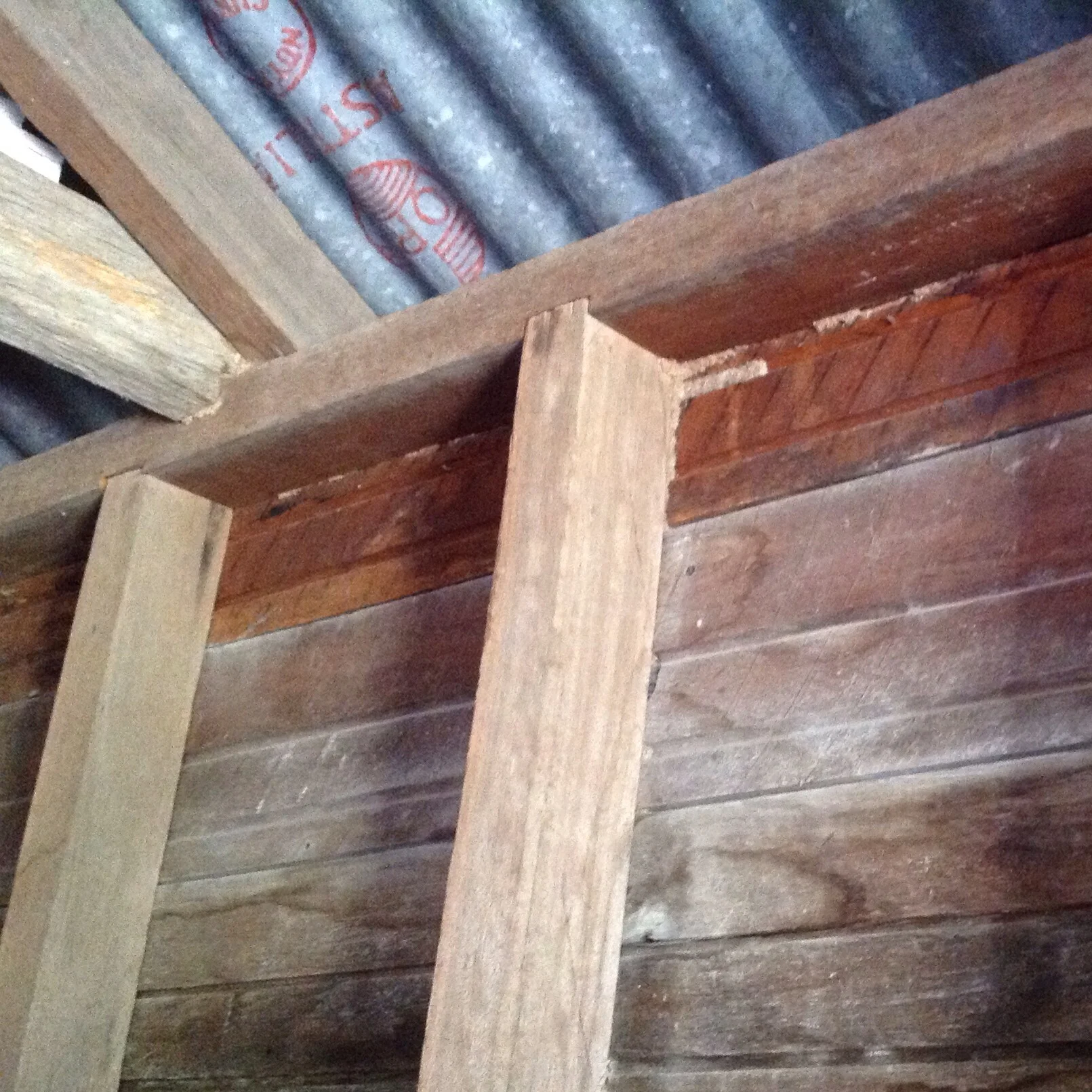 You can clearly see how the termites have made it all the way to the roof trusses.